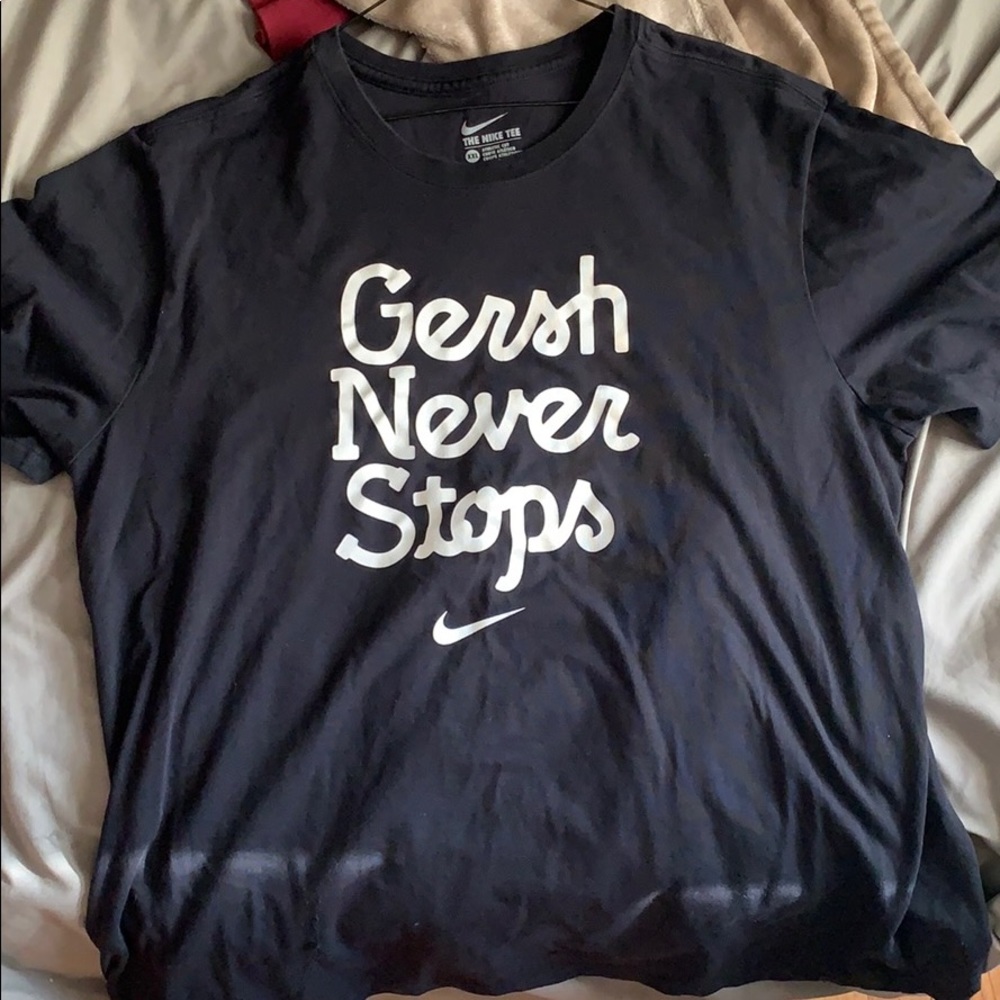 Nike “GERSH NEVER STOPS” dri-fit tee.